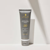 Mineral Tinted Face Sunscreen in "Medium/Dark"